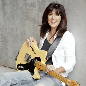 Jess Leary and her yellow electric guitar