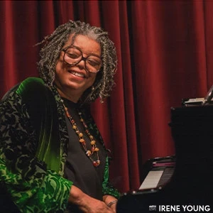 Mary Watkins at the piano